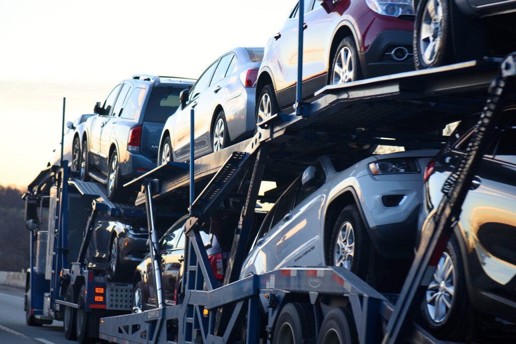 vehicle delivery lorry loaded with cars